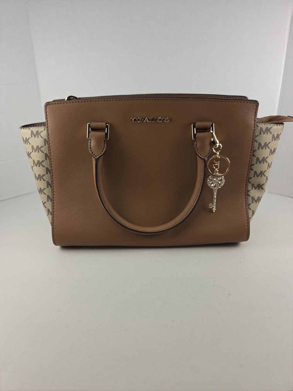 Like New Michael Kors Tan Saffiano Leather and Logo Satchel W Strap & Charm